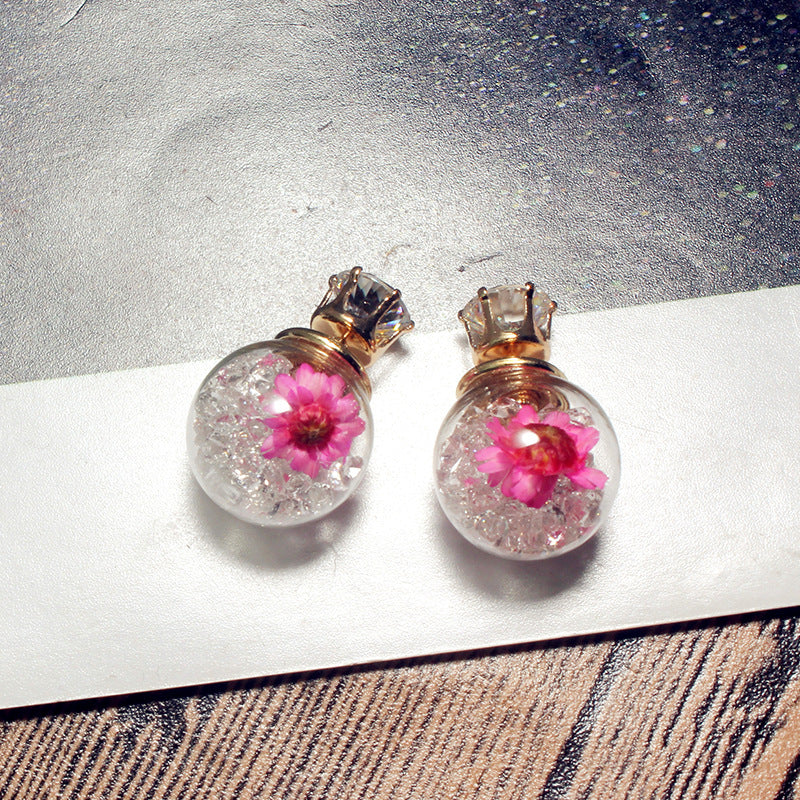 Round earrings with rhinestone flowers on both sides